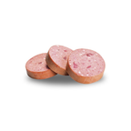 Three slices of Brit Premium Chicken sausage on a white background