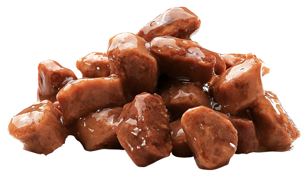Chunks of Brit Premium Adult Chicken & Turkey in Gravy Wet Cat Food on a white background